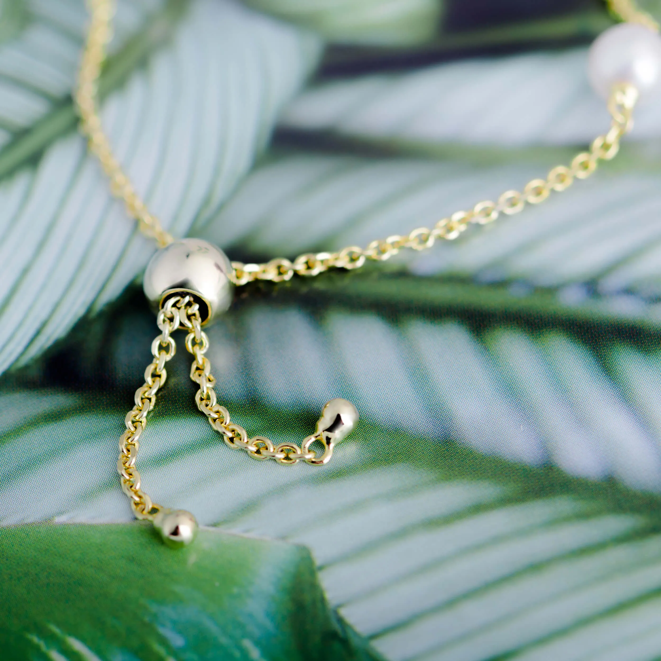 Molah Silver Gold Plated Freshwater Pearl and Cubic Zirconia Bolo Adjustable Bracelet